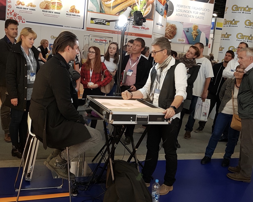 Sandportraits an Messe